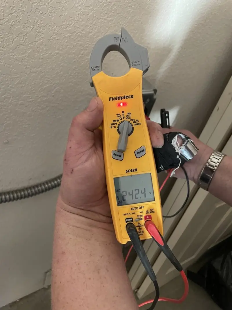 Voltage testing with clamp meter during Circuit Breaker Repair in Airway Heights